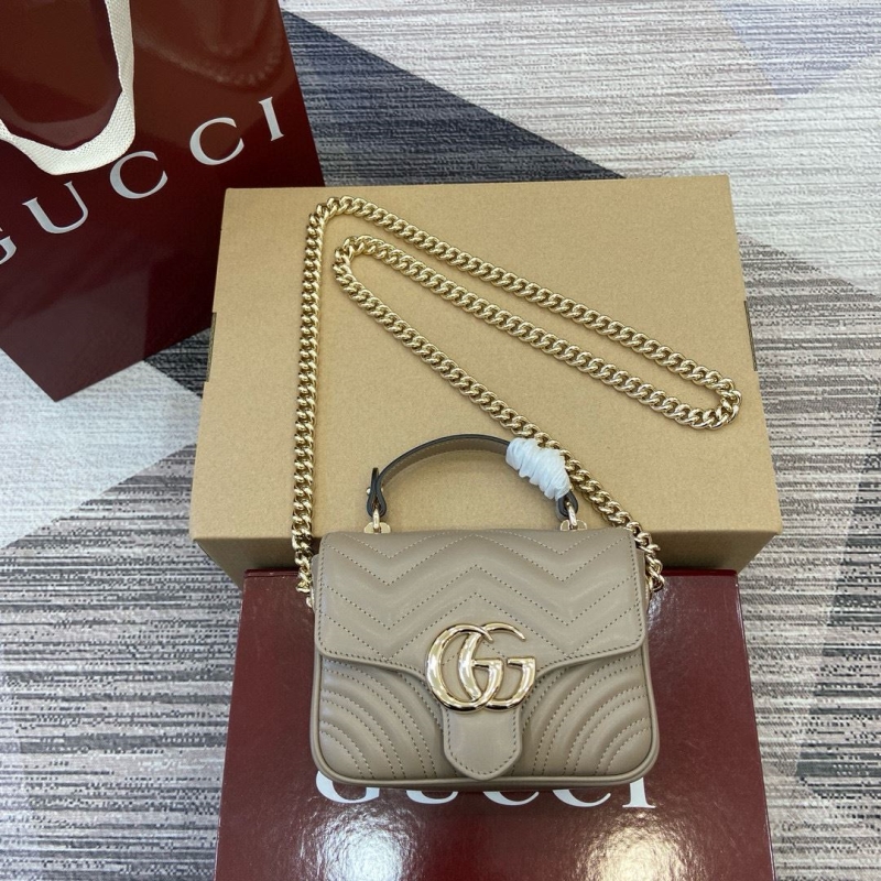 G*u*i top handle bags